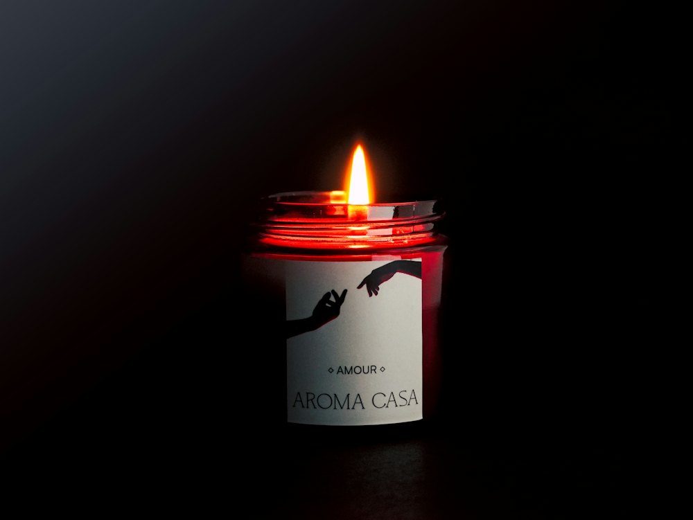 Lit massage candle
